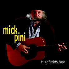 Mick Pini Playing A Guitar For The Album Highfields Boy